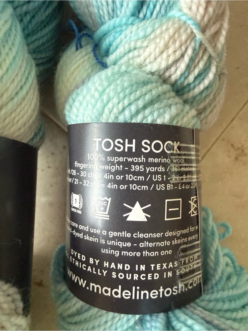 Madelinetosh Hand-Dyed Yarn Skeins in Aqua and Pale Blue